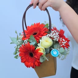 Sunlight Whisper — Mini Bag with Orange Gerberas & White Spray Roses
