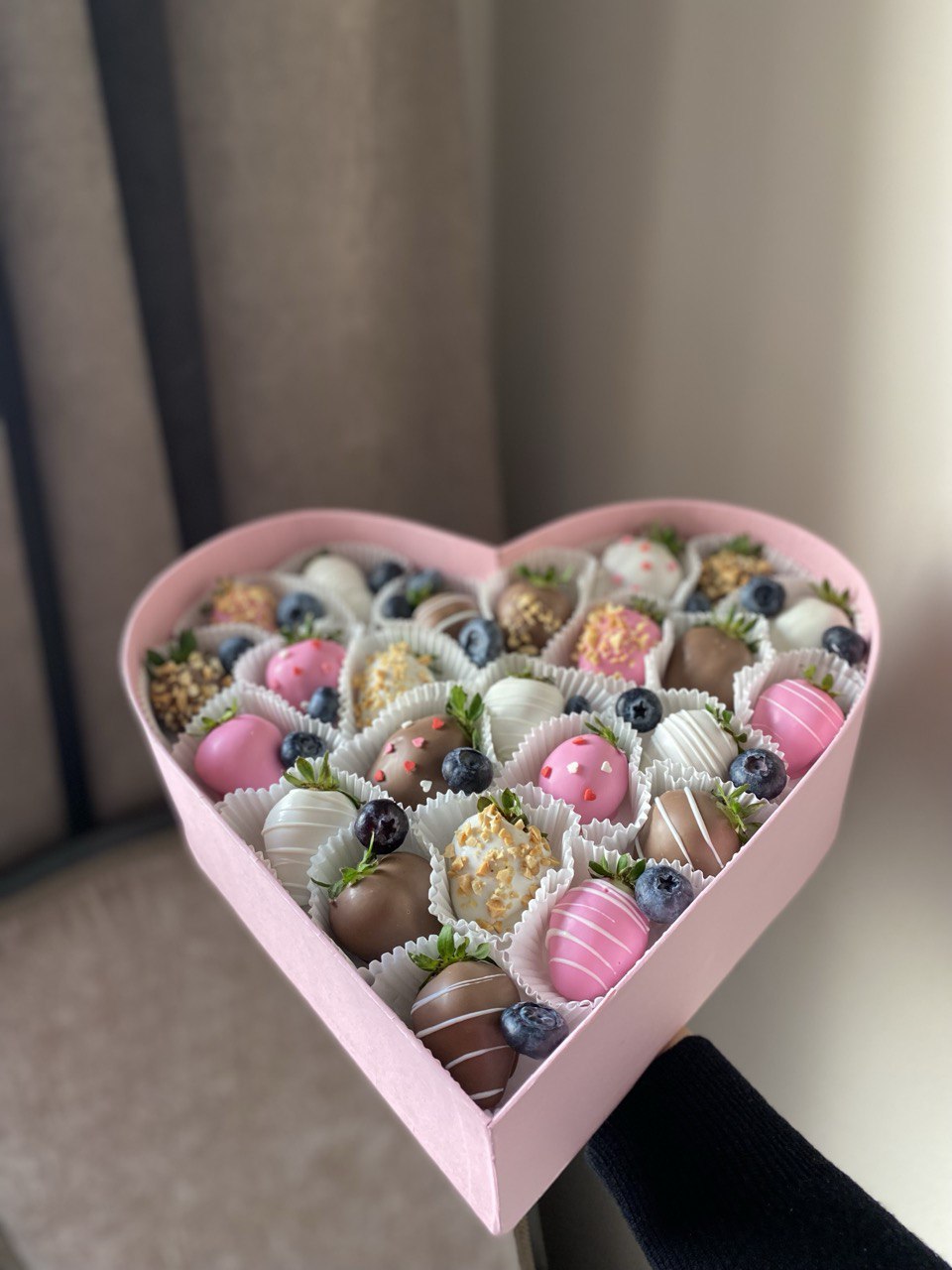 Strawberry set in a heart-shaped box