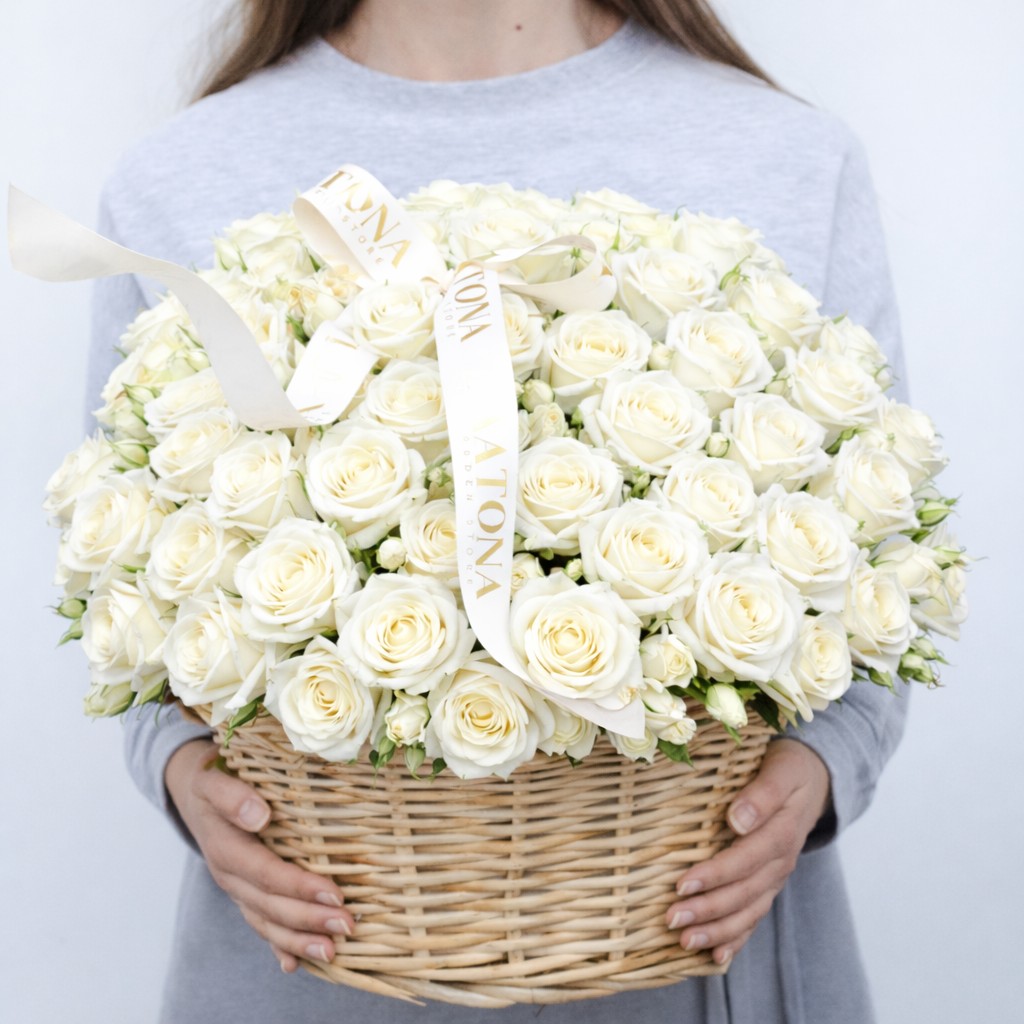 Basket with white roses
