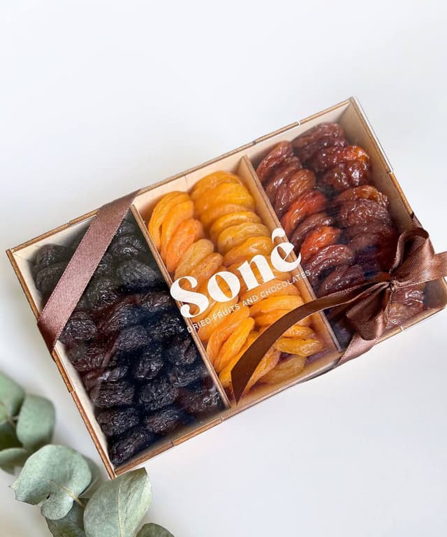 Dried fruits assortment in a wooden box 1 - Dried Fruits Sone