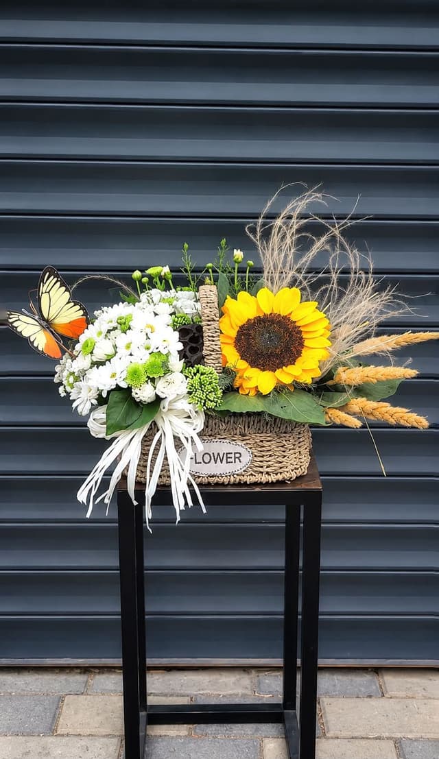 Floral arrangement in a basket - Moani Flowers