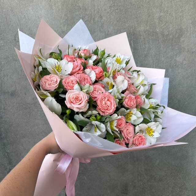 Author's bouquet of roses and alstroemerias