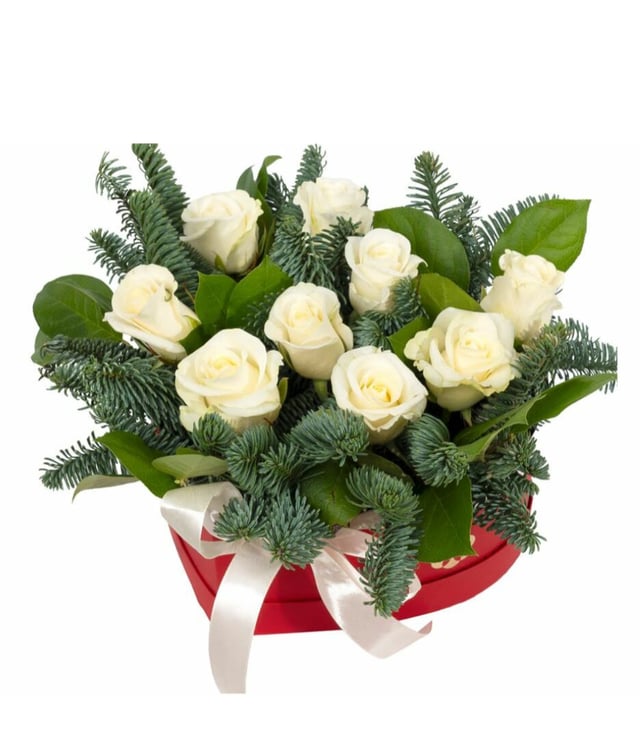 Composition with white roses and fir branches