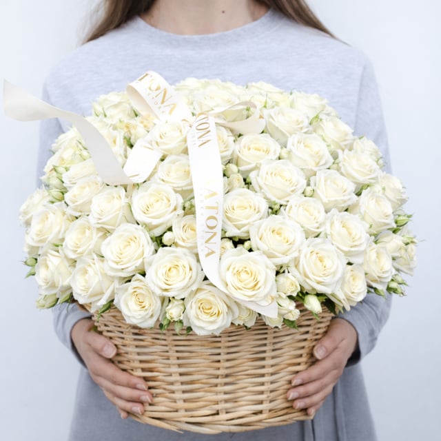 Basket with white roses
