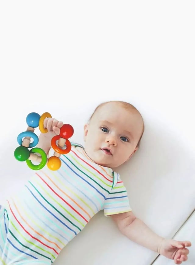 Многоцветная игрушка с кольцами