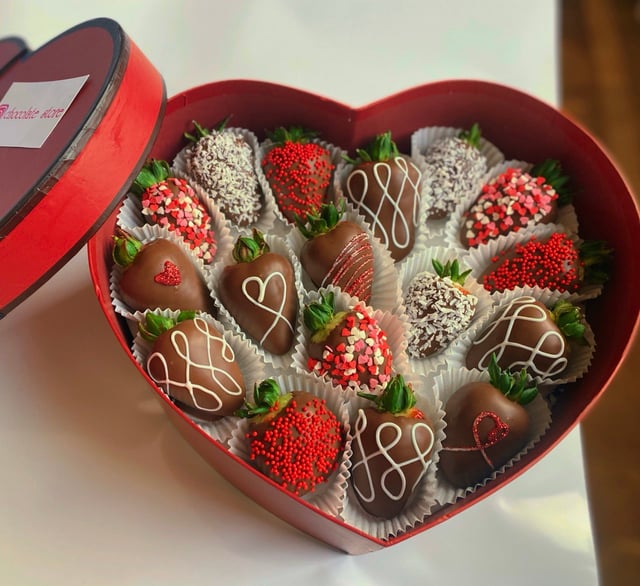 Heart-shaped box with chocolate-covered strawberries