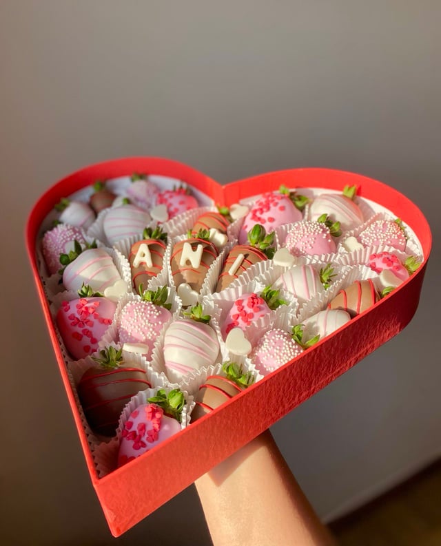 Heart-shaped box with name strawberries
