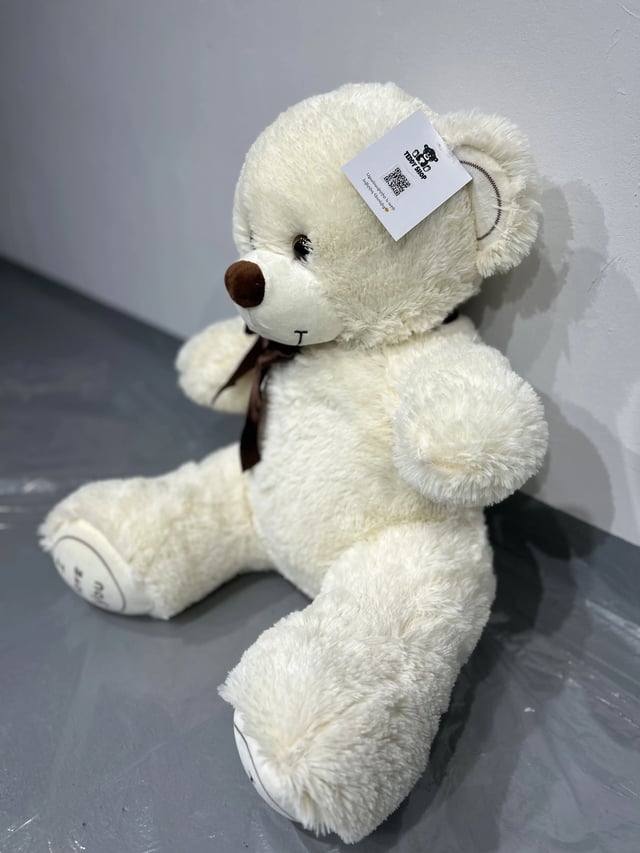 Soft teddy bear "Miki" in milk color, 65 cm.