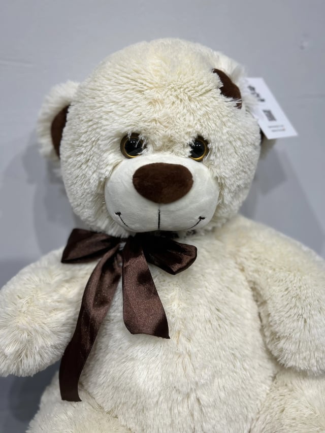 Soft teddy bear "Tom" in milky color, 65 cm.
