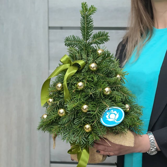 Gold-colored small Christmas tree